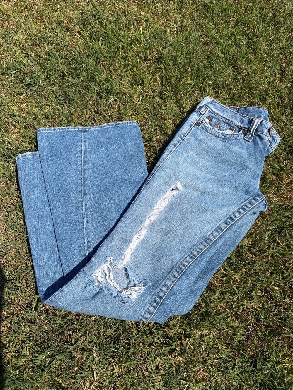 True Religion Light Blue Distressed Boot Cut Jeans
